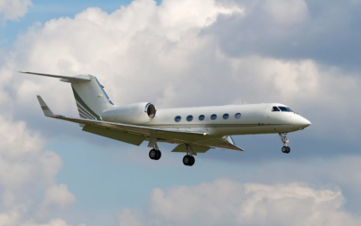 Commercial aeroplane flying above clouds representing Advanced Course in Airline and Airport Operations