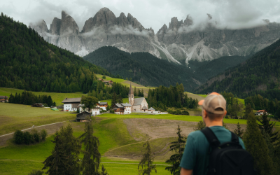 Traveller exploring scenic mountain landscape during an online certificate course in travel & tourism management