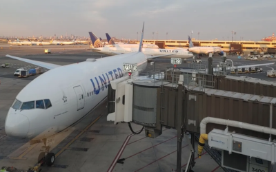 Passengers boarding an aeroplane at the airport terminal showcasing airport ground staff course operations